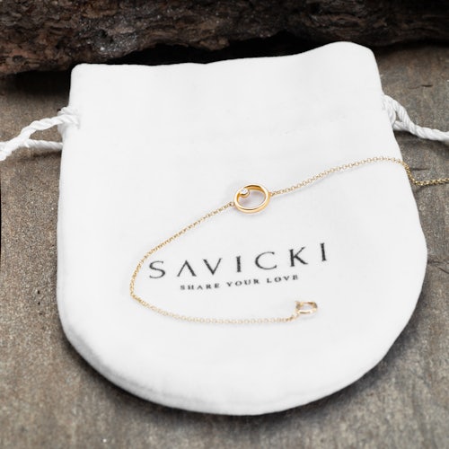 Bransoletka koło Savicki: złota, diament